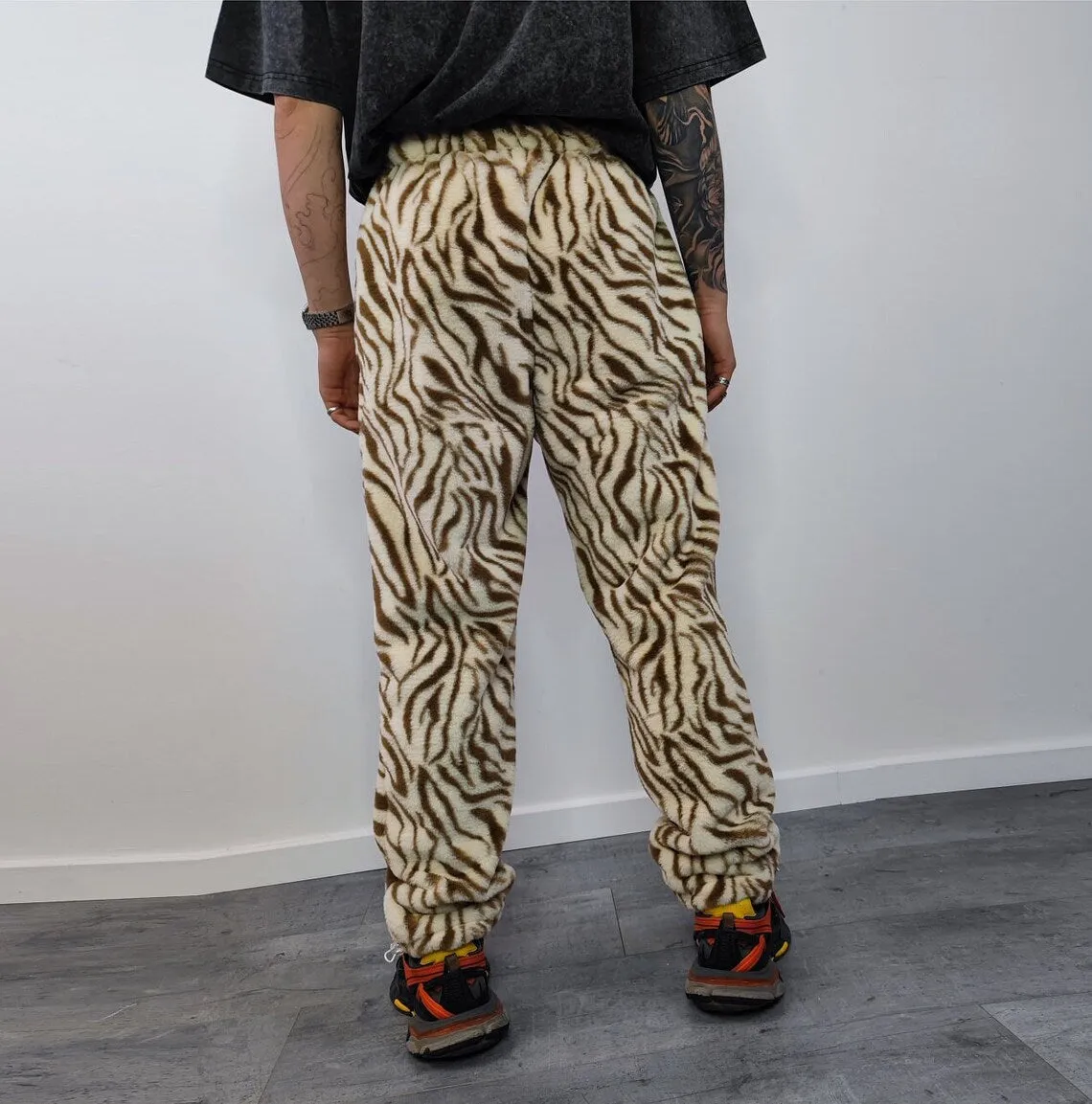 Faux fur zebra joggers animal print pants handmade stripe fleece raver trousers premium party overalls in zigzag festival pants brown beige